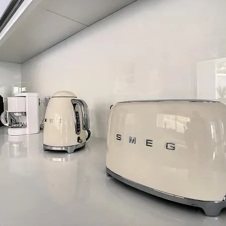 Апартаменты Uptown By Lovelystay